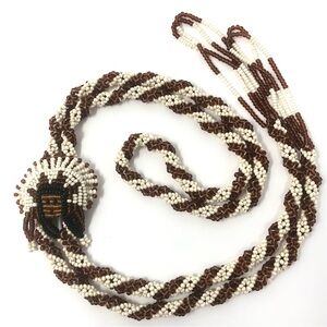 Indigenous vintage seed bead bolo and figural pendant necklace